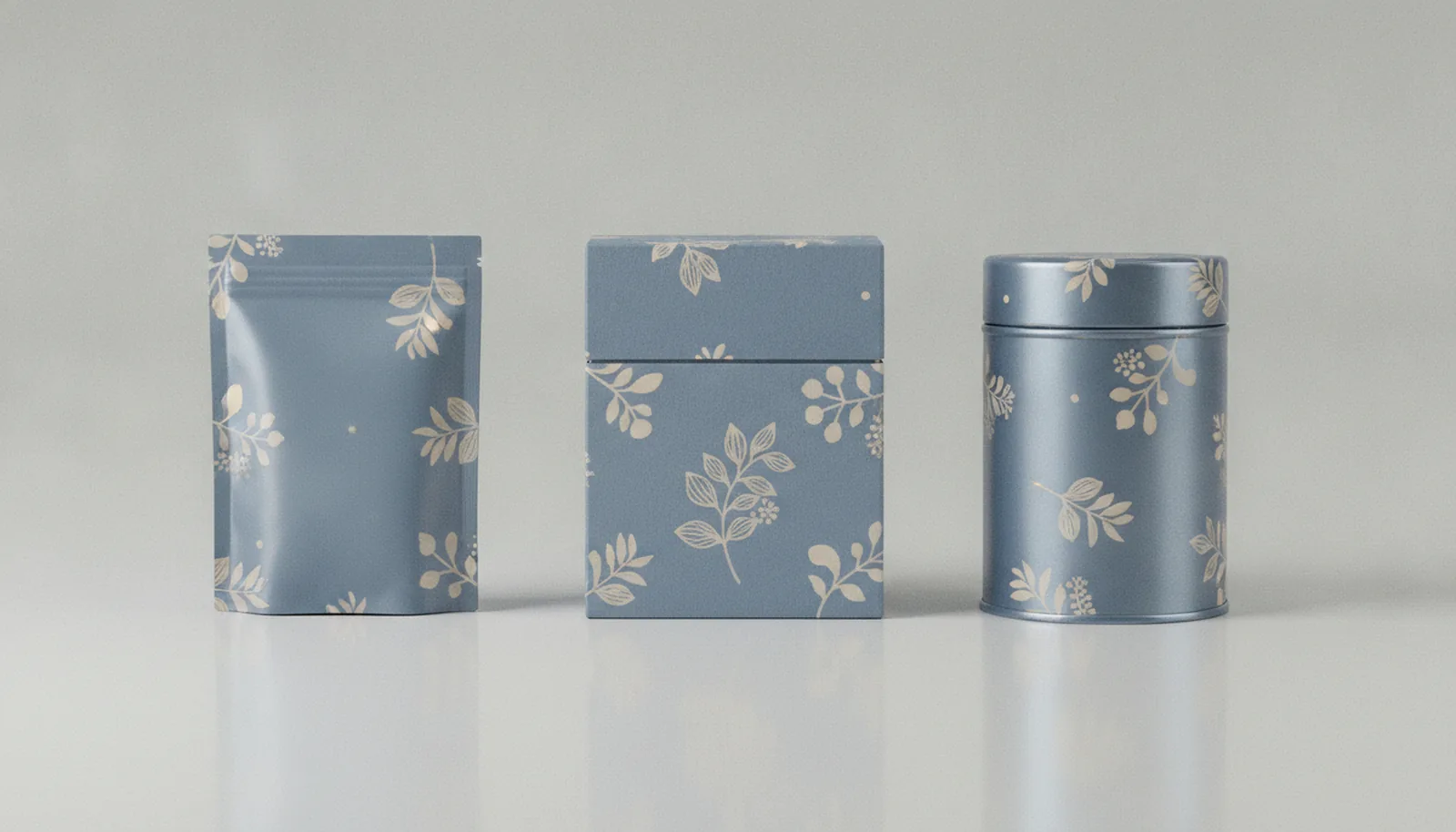 Pouch, carton and tin lined up to show a good-better-best store brand tier structure